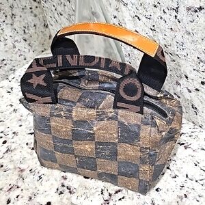 Fendi mini bag fading peeling petina clean on the inside. Handles and zip gorgeo